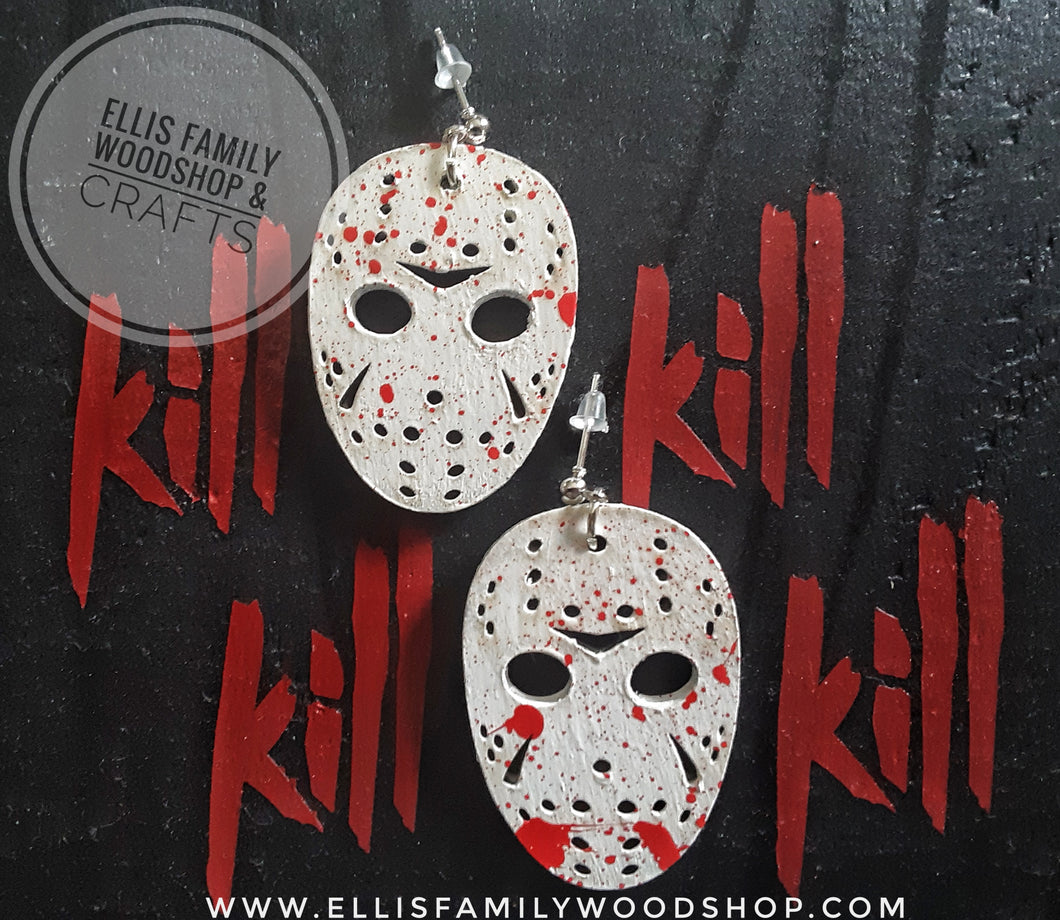 Bloody hockey mask earrings.